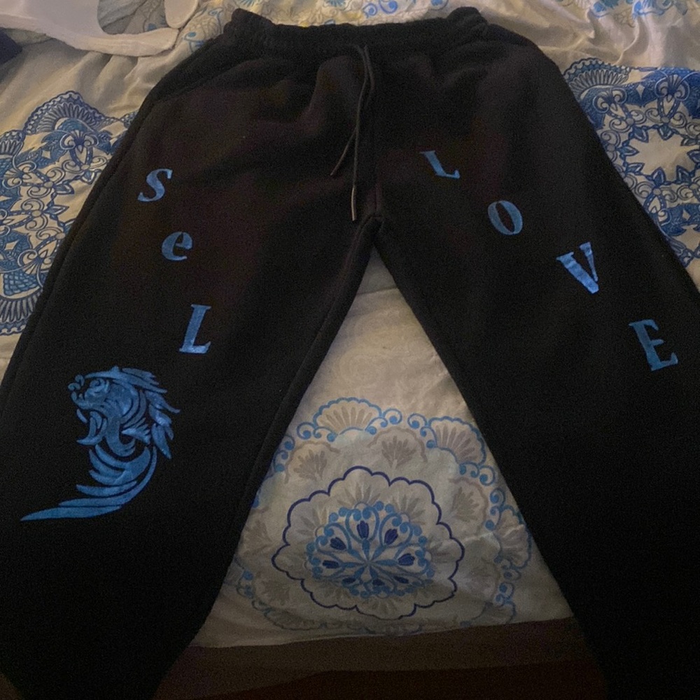 Black sweatpants with selfish love